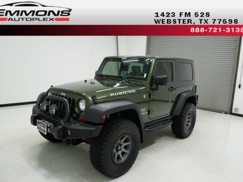 Used 2009 Jeep Wrangler Rubicon w/ Dual Top Group AWD/4WD image 1