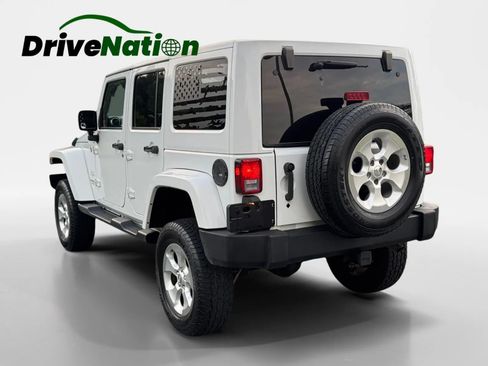 Used 2015 Jeep Wrangler Unlimited Sahara w/ Dual Top Group AWD/4WD image 7