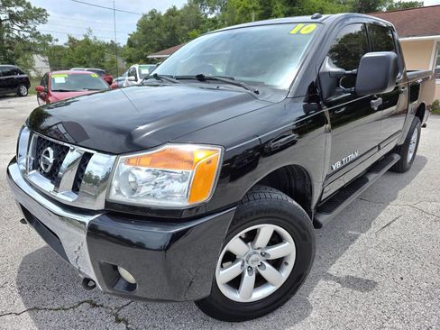 Used 2010 Nissan Titan SE w/ SE Value Truck Pkg AWD/4WD image 1