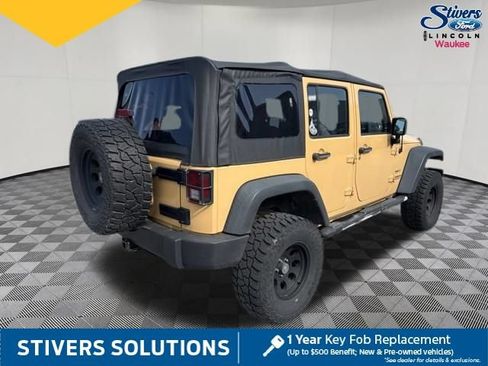 Used 2013 Jeep Wrangler Unlimited Sport w/ Mopar Black Appearance Group AWD/4WD image 6