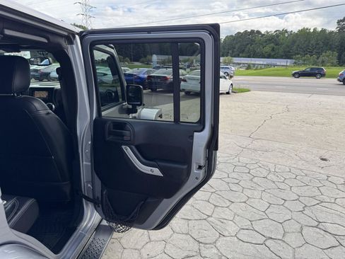 Used 2015 Jeep Wrangler Unlimited Sahara w/ Dual Top Group AWD/4WD image 15