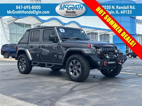 Used 2018 Jeep Wrangler Unlimited Sahara w/ Dual Top Group AWD/4WD image 1