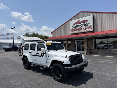 Used 2015 Jeep Wrangler Unlimited Sahara w/ Mopar Chrome Edition Group AWD/4WD image 1