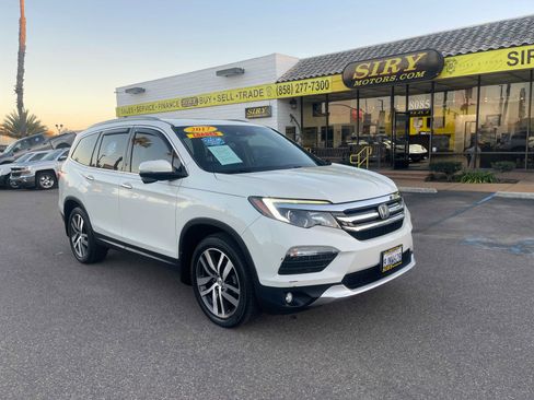 Used 2017 Honda Pilot Touring image 1