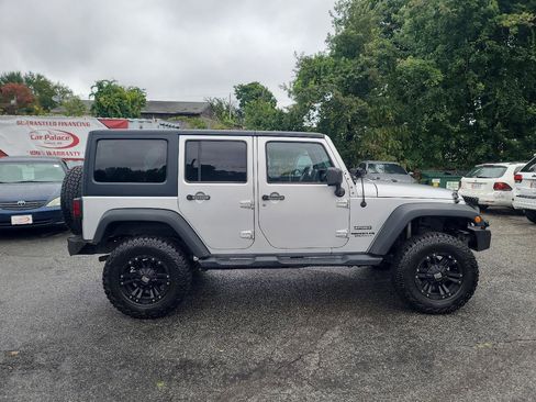 Used 2012 Jeep Wrangler Unlimited Sport w/ Dual Top Group AWD/4WD image 8