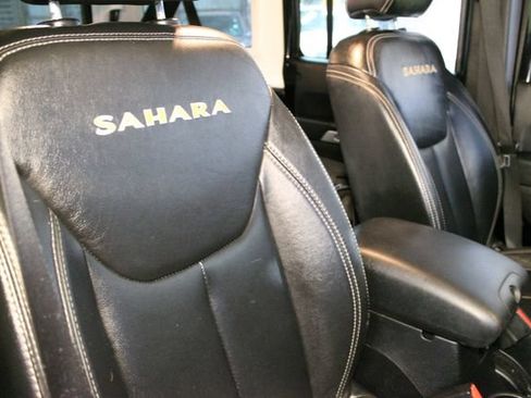 Used 2013 Jeep Wrangler Unlimited Sahara w/ Dual Top Group AWD/4WD image 11