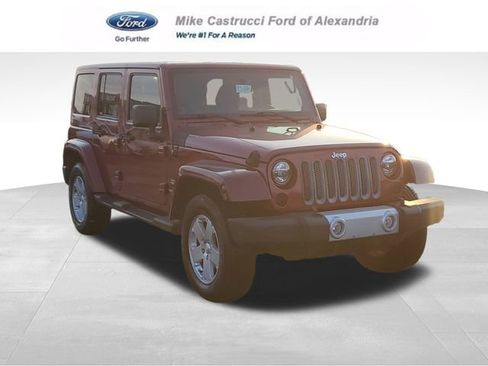 Used 2011 Jeep Wrangler Unlimited Sahara w/ Connectivity Group AWD/4WD image 1