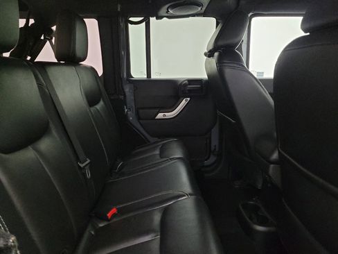 Used 2014 Jeep Wrangler Unlimited Rubicon w/ Dual Top Group AWD/4WD image 19