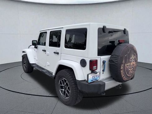 Used 2014 Jeep Wrangler Unlimited Sahara w/ Dual Top Group AWD/4WD image 3