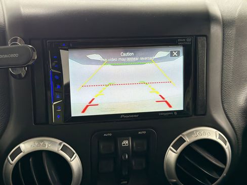 Used 2015 Jeep Wrangler Unlimited Sahara w/ Max Tow Package image 21