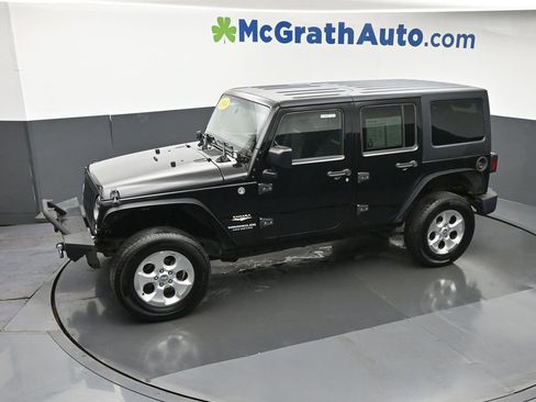 Used 2014 Jeep Wrangler Unlimited Sahara w/ Dual Top Group AWD/4WD image 21