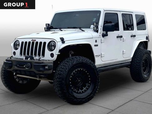 Used 2016 Jeep Wrangler Unlimited Sahara AWD/4WD image 1
