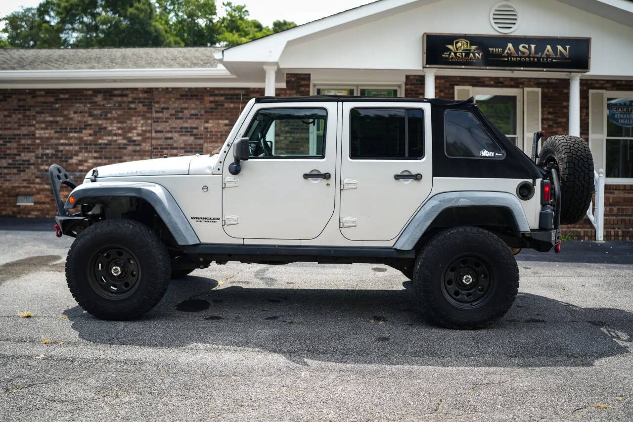 Used 2012 Jeep Wrangler Unlimited Rubicon w/ Dual Top Group AWD/4WD image 14