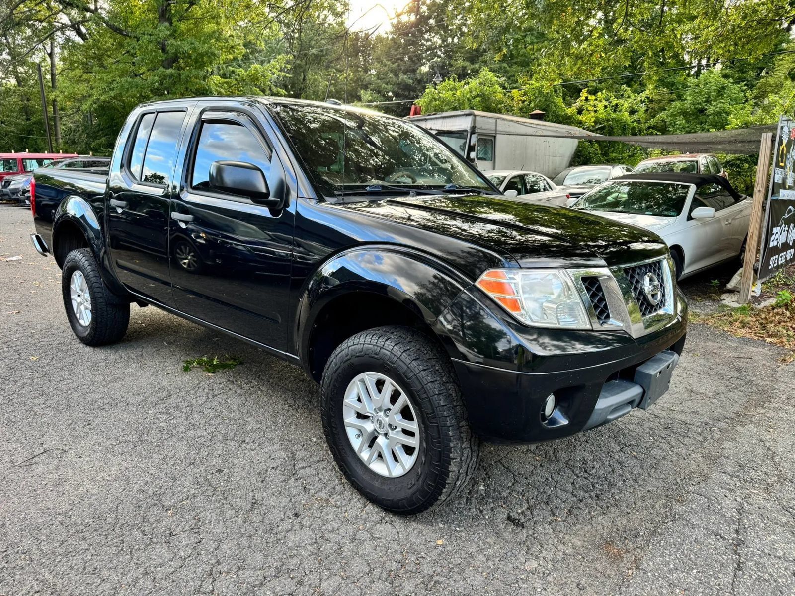 Used 2014 Nissan Frontier SV w/ SV Value Truck Package AWD/4WD image 3