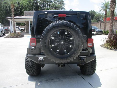 Used 2014 Jeep Wrangler Unlimited Rubicon w/ Max Tow Package AWD/4WD image 16