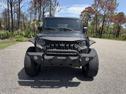 Used 2012 Jeep Wrangler Unlimited Sport w/ Connectivity Group AWD/4WD image 8
