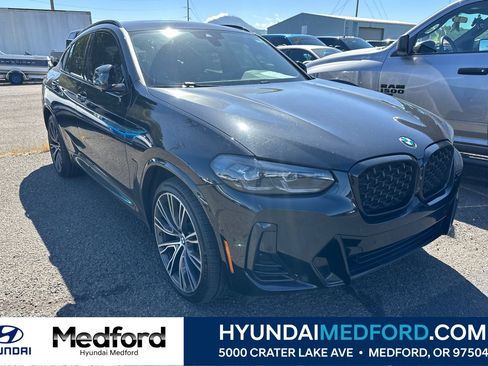Used 2023 BMW X4 xDrive30i w/ M Sport Package AWD/4WD image 1