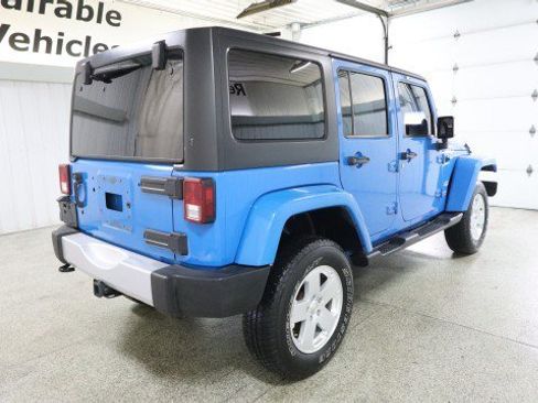 Used 2012 Jeep Wrangler Unlimited Sahara w/ Dual Top Group AWD/4WD image 6