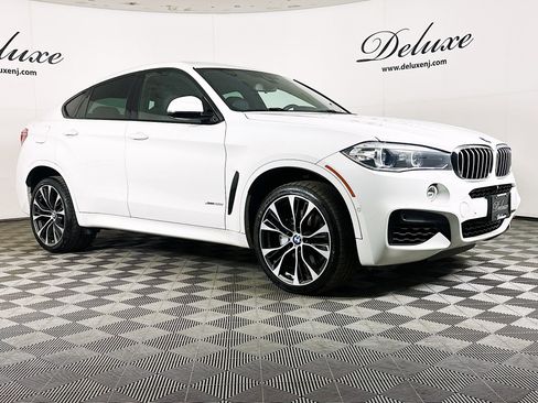 Used 2019 BMW X6 xDrive50i w/ M Sport Package image 1