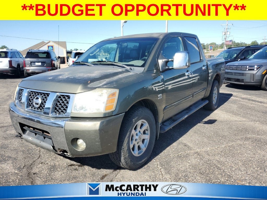 Used 2004 Nissan Titan LE w/ (OF1) LE Off-Road Pkg AWD/4WD image 1