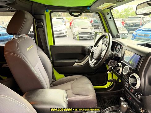 Used 2013 Jeep Wrangler Unlimited Sahara w/ Dual Top Group AWD/4WD image 36