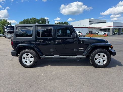 Used 2012 Jeep Wrangler Unlimited Sahara w/ Dual Top Group AWD/4WD image 6