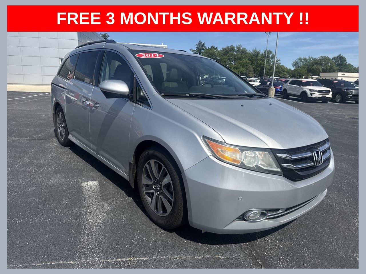 Used 2014 Honda Odyssey Touring image 1