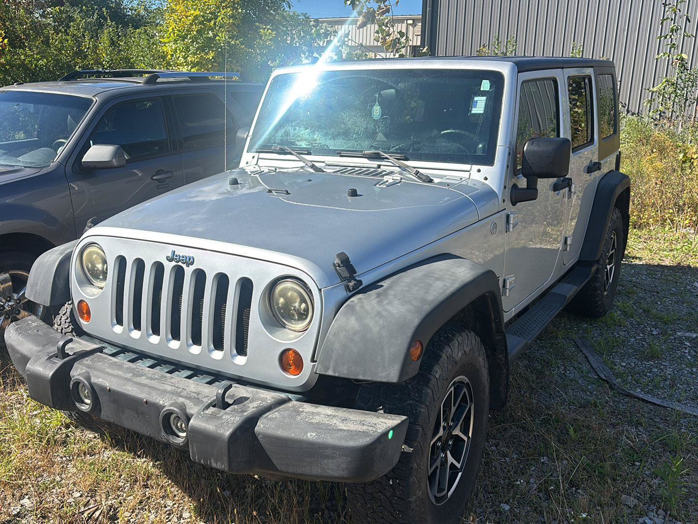 Used 2010 Jeep Wrangler Unlimited Sport AWD/4WD image 1