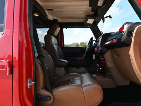 Used 2012 Jeep Wrangler Unlimited Sahara w/ Dual Top Group AWD/4WD image 22