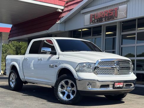 Used 2016 RAM 1500 Laramie AWD/4WD image 1