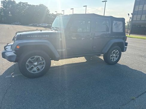 Used 2017 Jeep Wrangler Unlimited Rubicon w/ Dual Top Group AWD/4WD image 1
