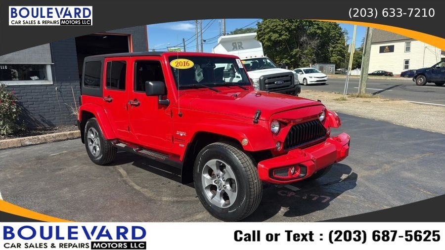 Used 2016 Jeep Wrangler Unlimited Sahara AWD/4WD image 1