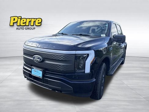 Used 2024 Ford F150 Lightning XLT AWD/4WD image 1