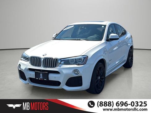 Used 2016 BMW X4 xDrive28i AWD/4WD image 1