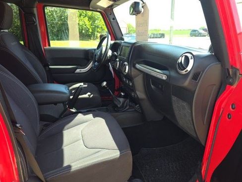 Used 2013 Jeep Wrangler Unlimited Rubicon w/ Dual Top Group AWD/4WD image 12