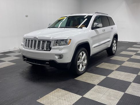 Used 2013 Jeep Grand Cherokee Overland Summit AWD/4WD image 1