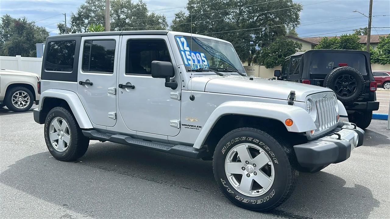 Used 2012 Jeep Wrangler Unlimited Sahara w/ Max Tow Pkg AWD/4WD image 8