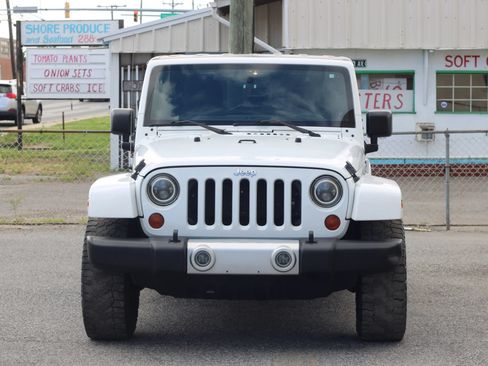 Used 2012 Jeep Wrangler Unlimited Sahara w/ Dual Top Group AWD/4WD image 2