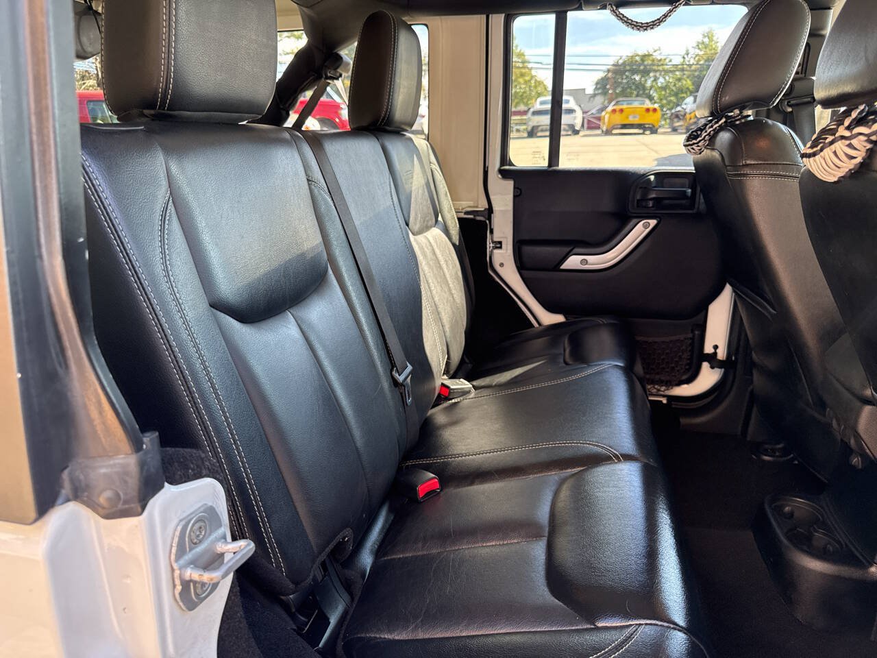 Used 2013 Jeep Wrangler Unlimited Sahara w/ Dual Top Group AWD/4WD image 16