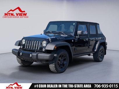 Used 2014 Jeep Wrangler Unlimited Sport