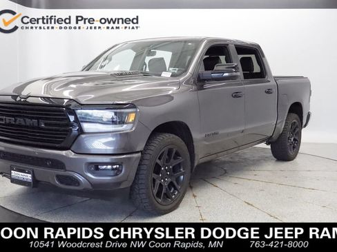 Used 2024 RAM 1500 Laramie AWD/4WD image 1