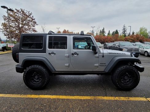 Used 2013 Jeep Wrangler Unlimited Sport image 1