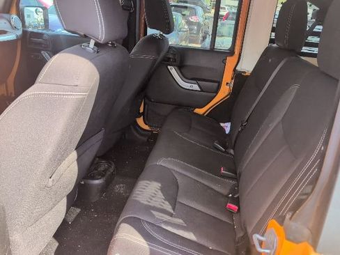 Used 2013 Jeep Wrangler Unlimited Sahara w/ Dual Top Group AWD/4WD image 10