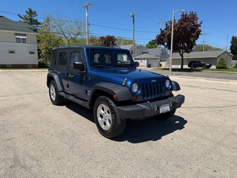 Used 2010 Jeep Wrangler Unlimited Sport AWD/4WD image 1