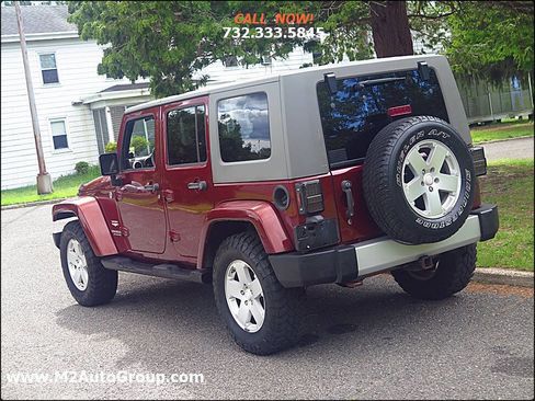 Used 2010 Jeep Wrangler Unlimited Sahara w/ Dual Top Group image 28