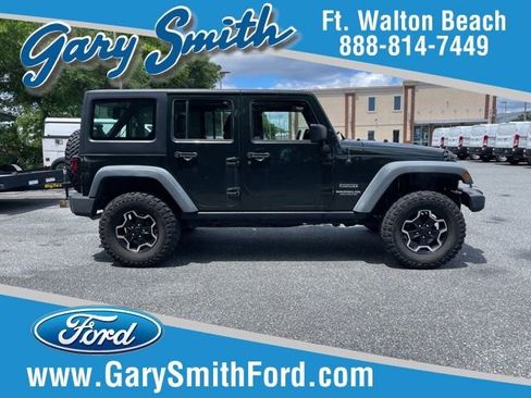 Used 2011 Jeep Wrangler Unlimited Sport AWD/4WD image 1