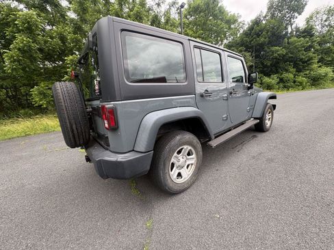 Used 2014 Jeep Wrangler Unlimited Sport AWD/4WD image 9