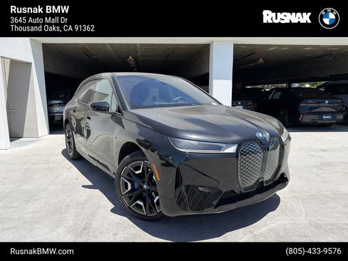 Used 2024 BMW iX xDrive50 w/ Sport Package AWD/4WD image 1