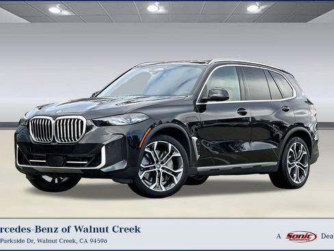 Used 2024 BMW X5 xDrive50e w/ Parking Assistance Package image 1