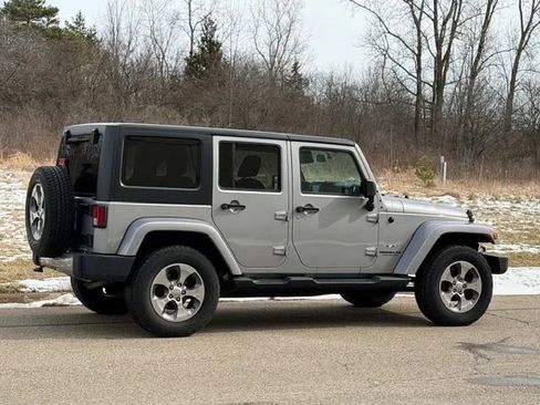 Used 2016 Jeep Wrangler Unlimited Sahara w/ Dual Top Group AWD/4WD image 24